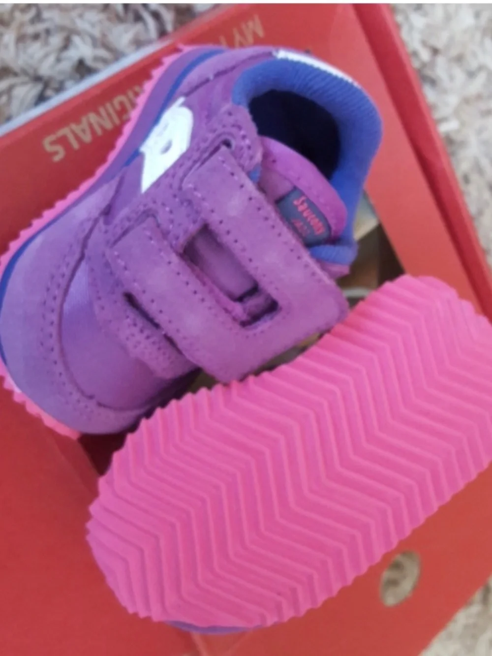 Saucony baby jazz crib shoes in purple and pink